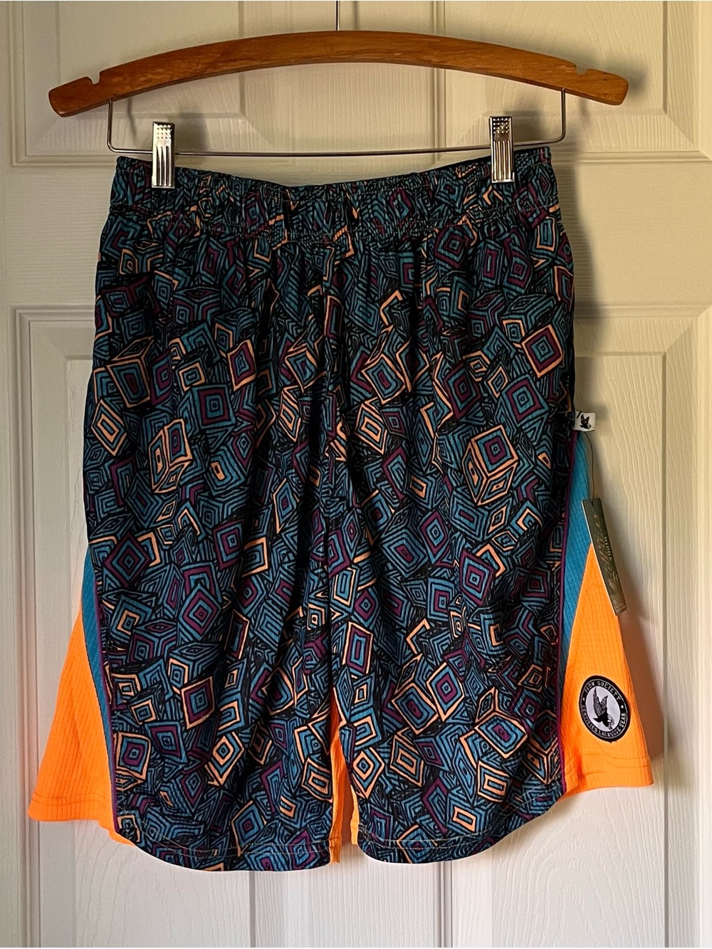 Flow Society Youth Lacrosse Athletic Shorts in Teal and Orange